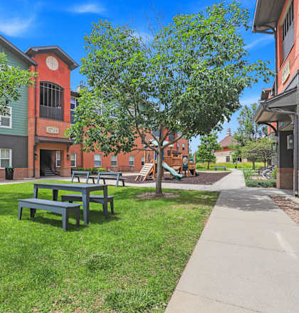 our apartments have a spacious courtyard with picnic tables at Switchback on Platte Apartments, Colorado, 80120