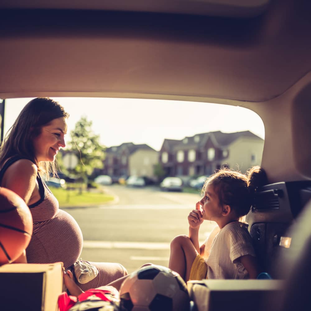 Resident doing mother and child in car near Ironwood on North Salem in Apex, North Carolina