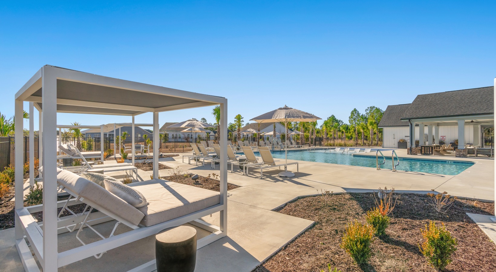 Townhomes With Attached Garage In Myrtle Beach, SC - ABODE At Carolina Forest - Resort-Style Swimming Pool With Cabanas & Sun Deck.