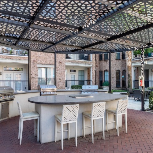 Grilling station and lush landscaping