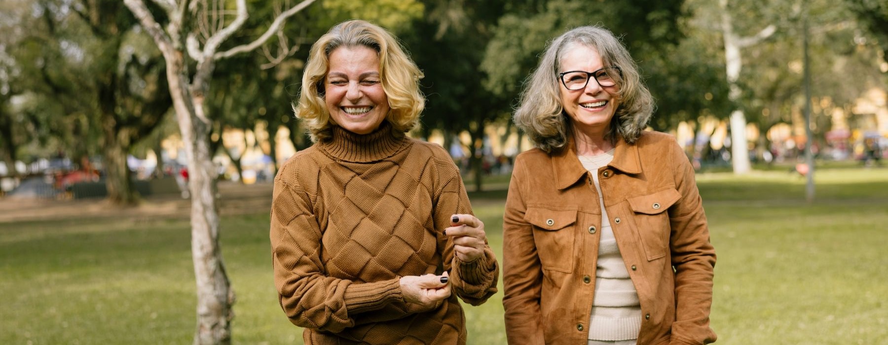 a couple of women smiling
