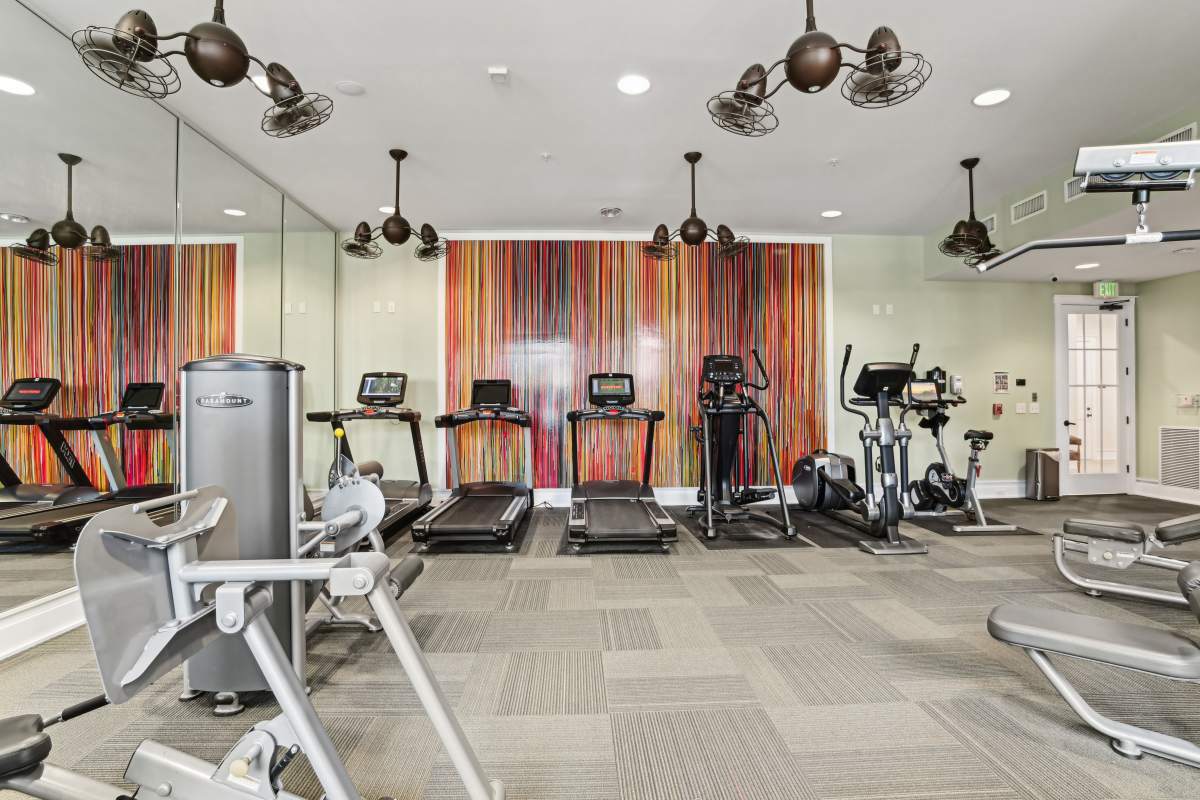 Well-equipped fitness center at Fountains at Mooresville Town Square in Mooresville, North Carolina