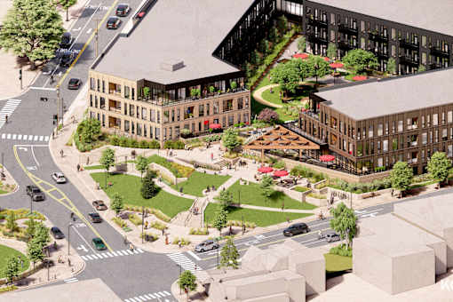 A rendering of a city intersection with a large building in the background.