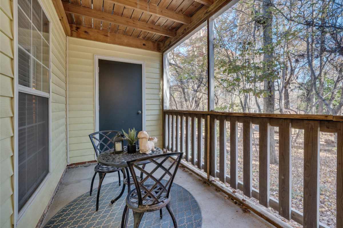 Private patio with chairs at Trailwood Crossing Apartments in Raleigh, North Carolina