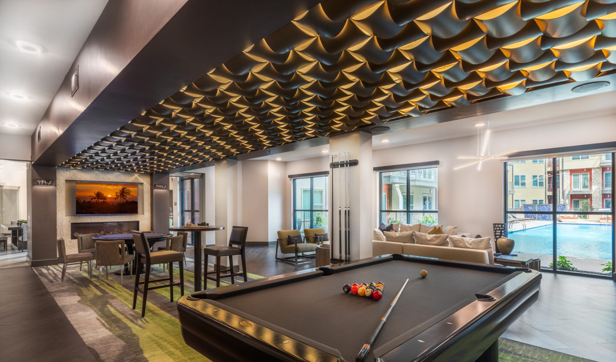 Clubhouse interior with fire place and billiards