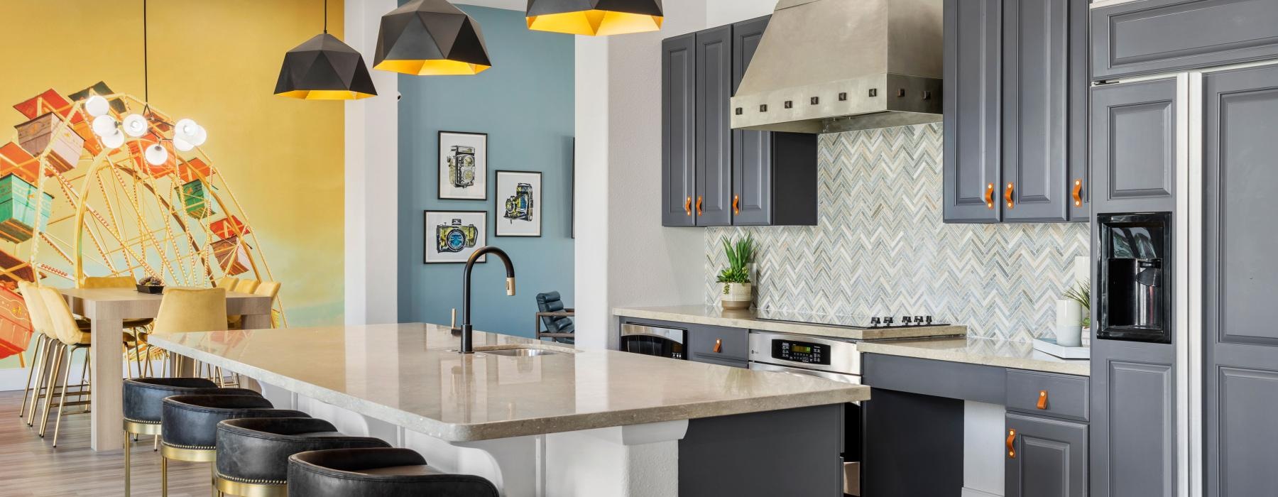a kitchen with a bar and stools