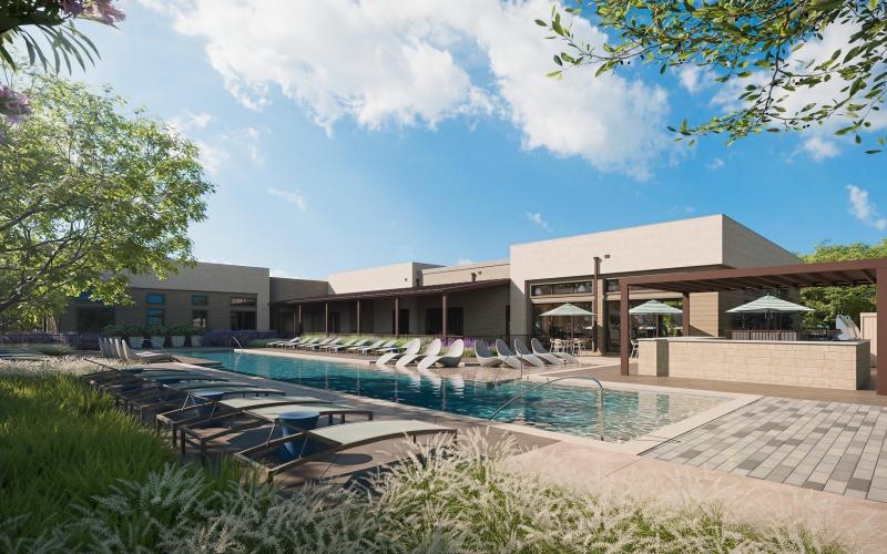 a swimming pool in front of a building