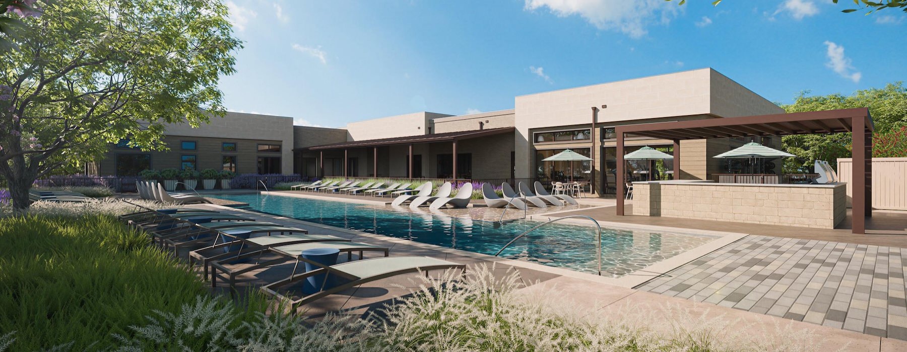 a swimming pool in front of a building