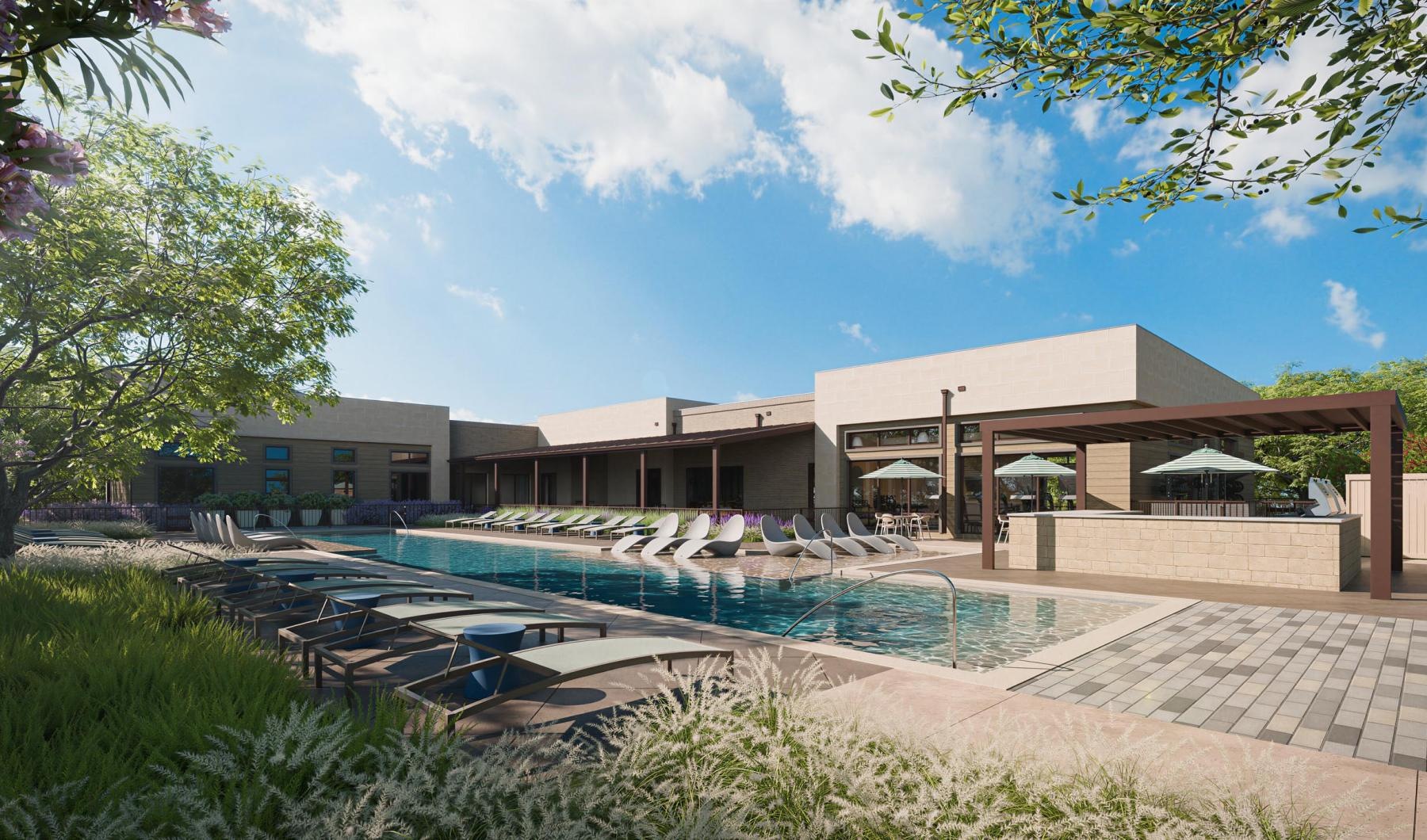 a swimming pool in front of a building
