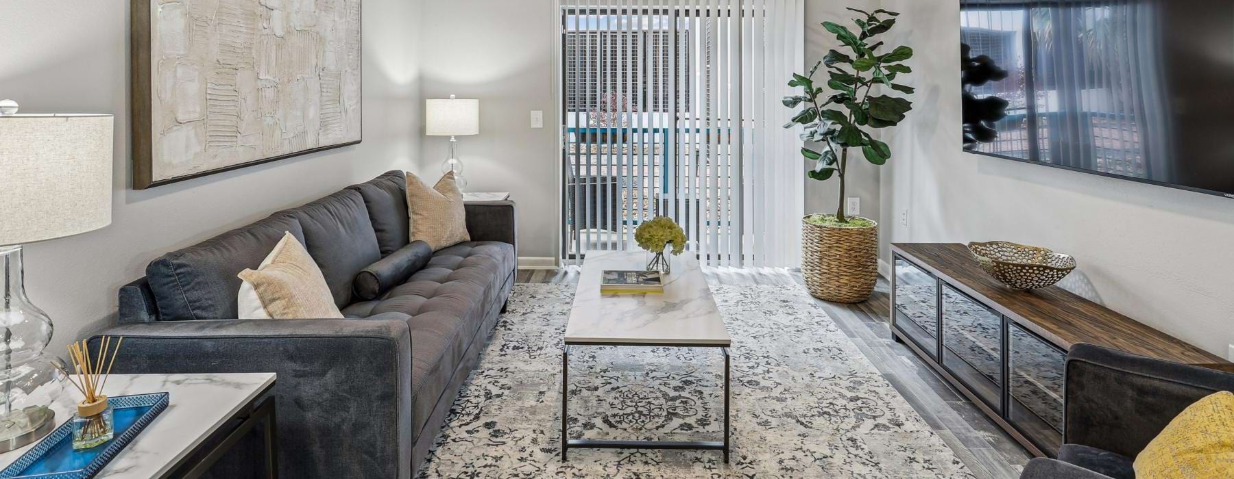 a living room with a couch and a table