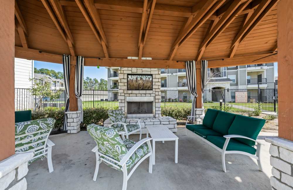 Covered community gathering areas at The Tennyson at Tomball in Tomball, Texas