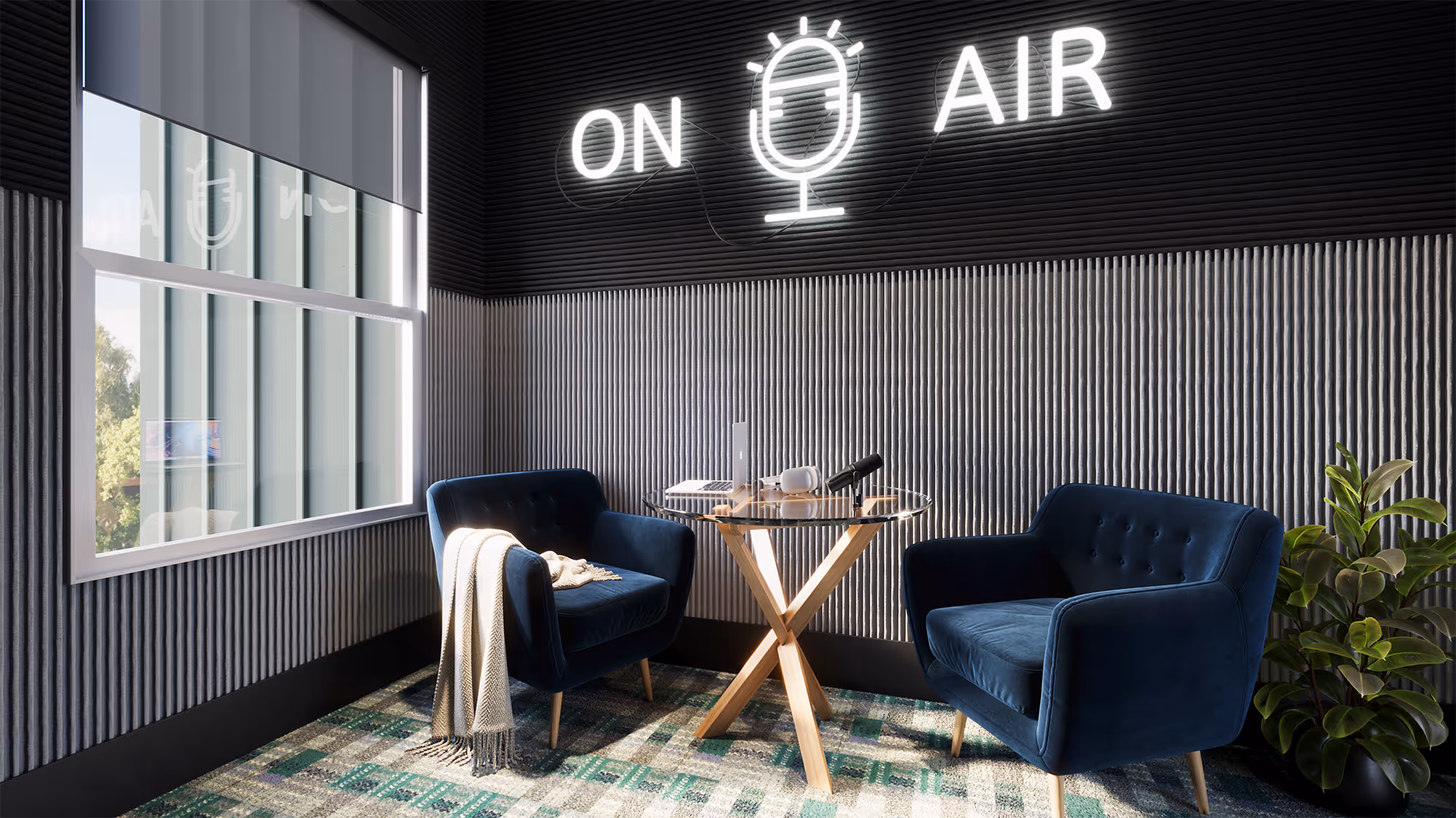 Dedicated podcast studio with two chairs, a glass table, and a neon "On Air" sign, a unique amenity at The Rook in Orlando, FL.