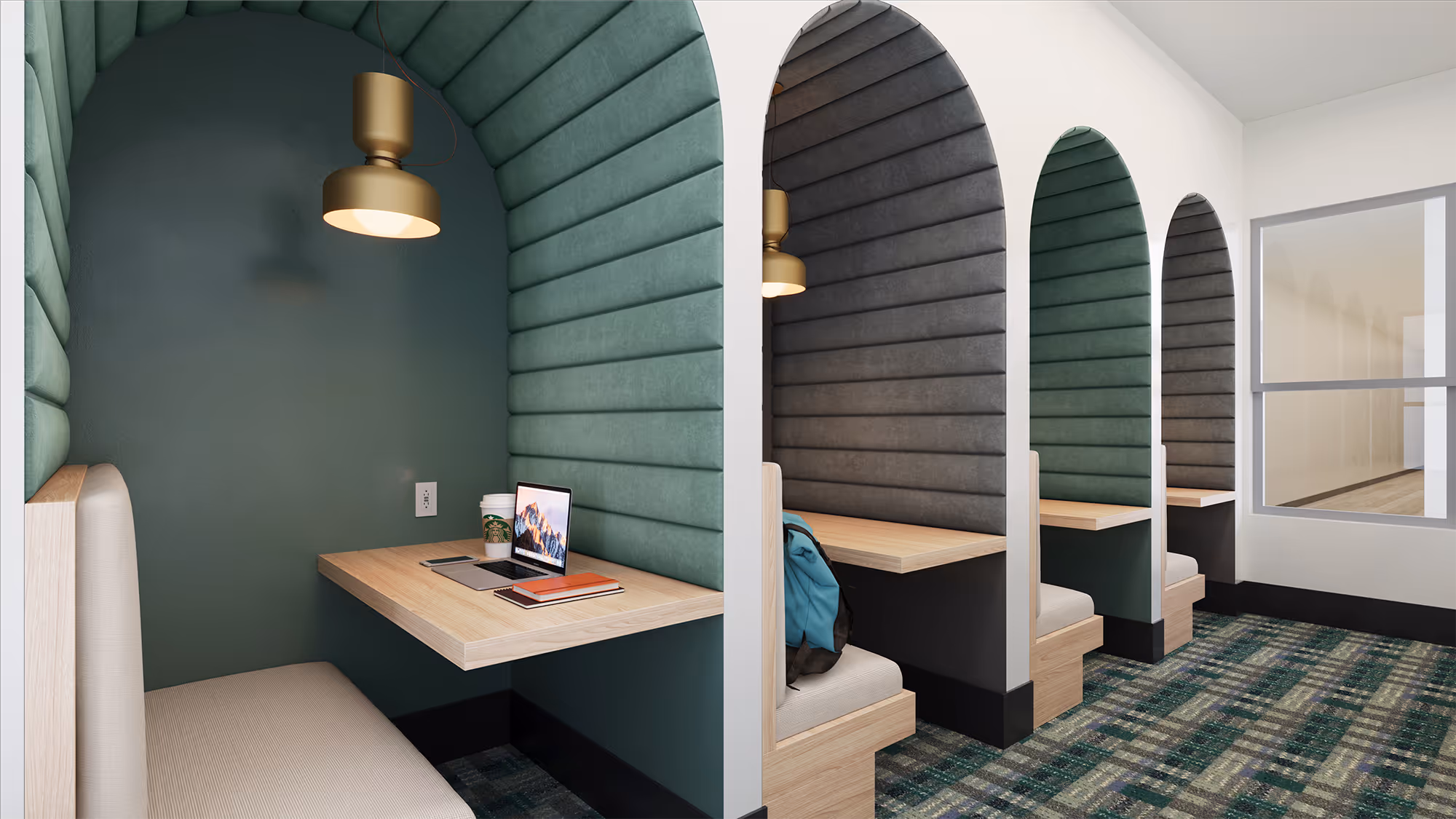 Private study pods with desks and modern lighting, providing a quiet and focused environment for residents at The Rook in Orlando, FL.