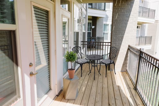 Patio with table and chair set at Sycamore at Tyvola, Charlotte, 28217