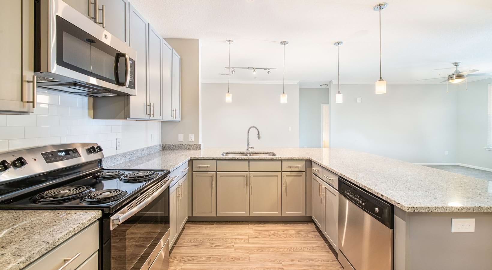 Granite Countertops + Pendant Lighting