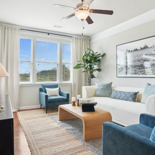 Stylish living space with large windows and open layout