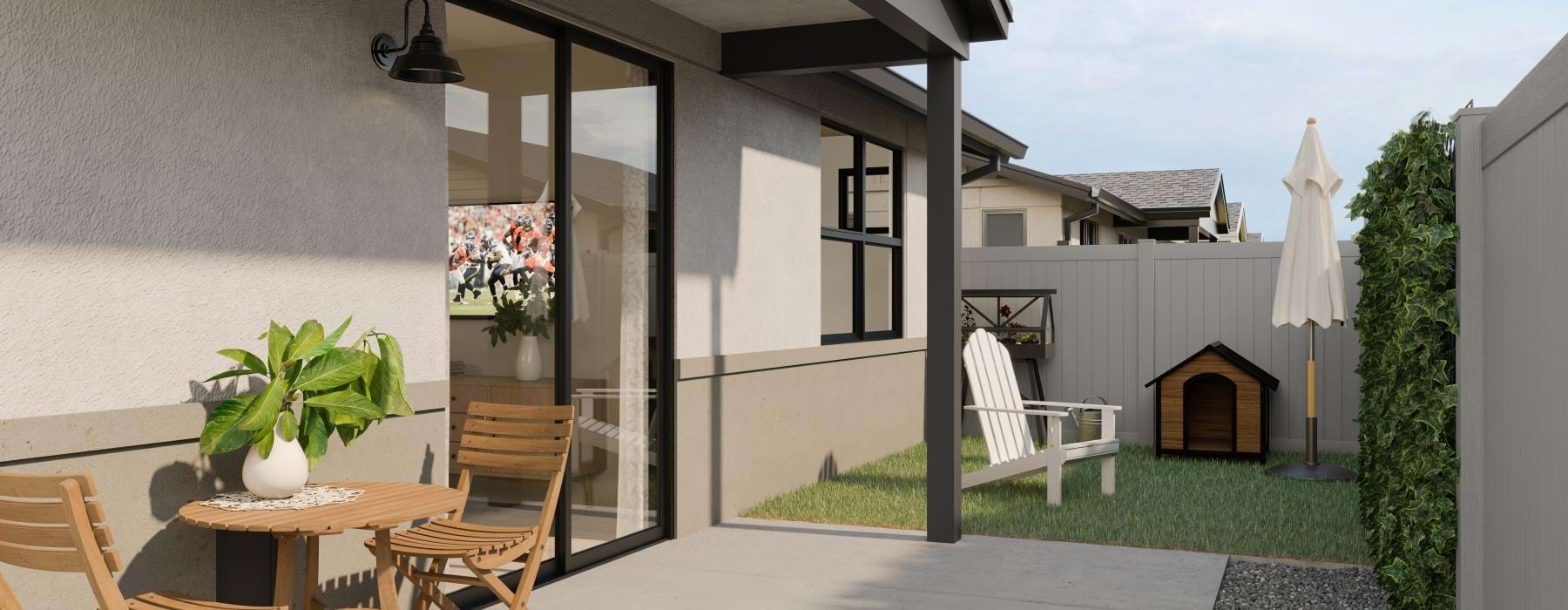 a patio with a table and chairs