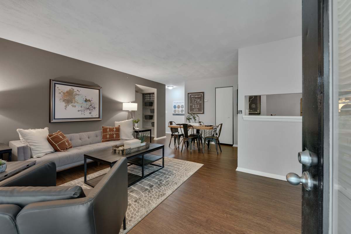 Spacious Living Room with Wood-Style Flooring at Lake Lynn Reserve Apartments, Raleigh, North Carolina