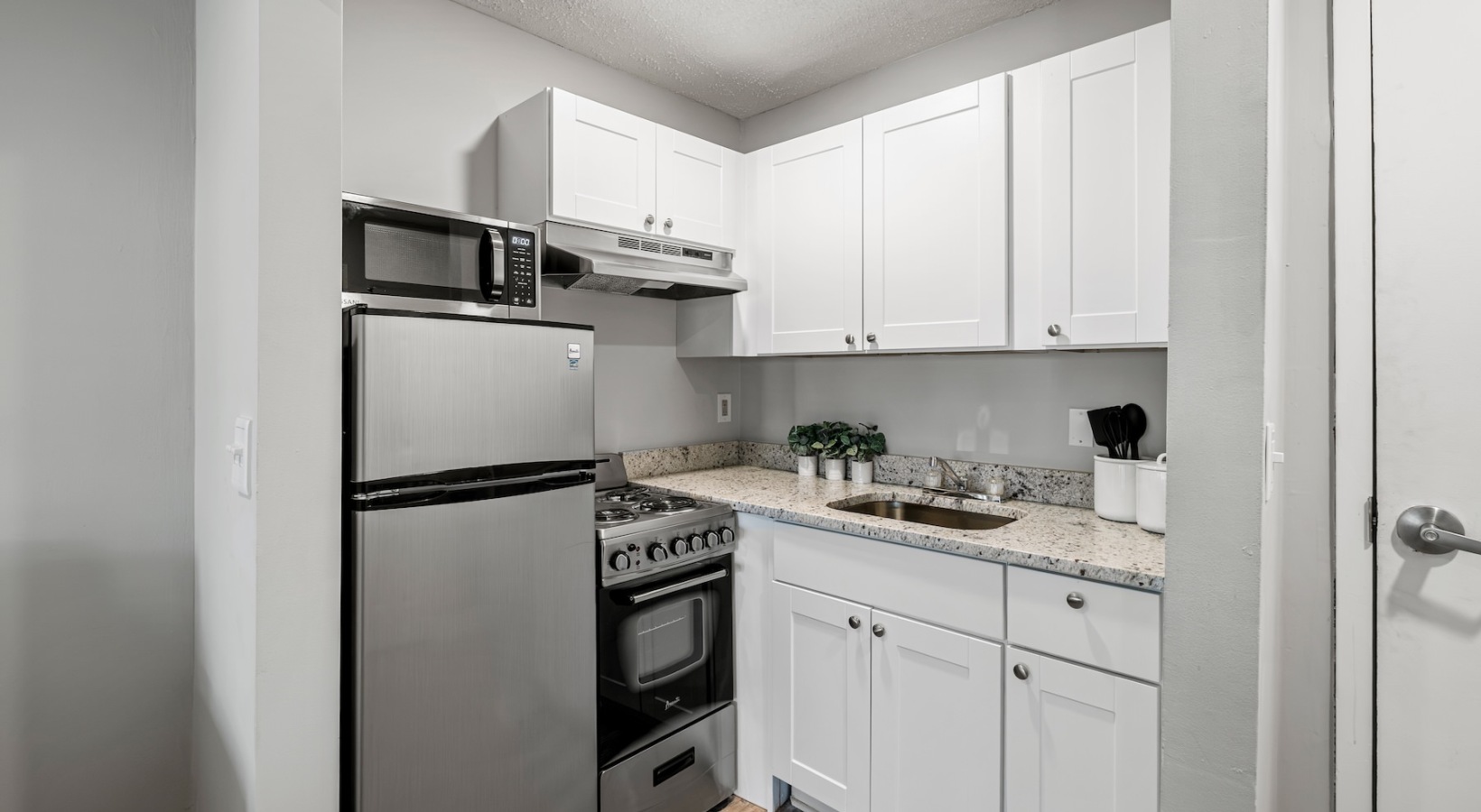 kitchen with white cabinets and stainless steel appliances
