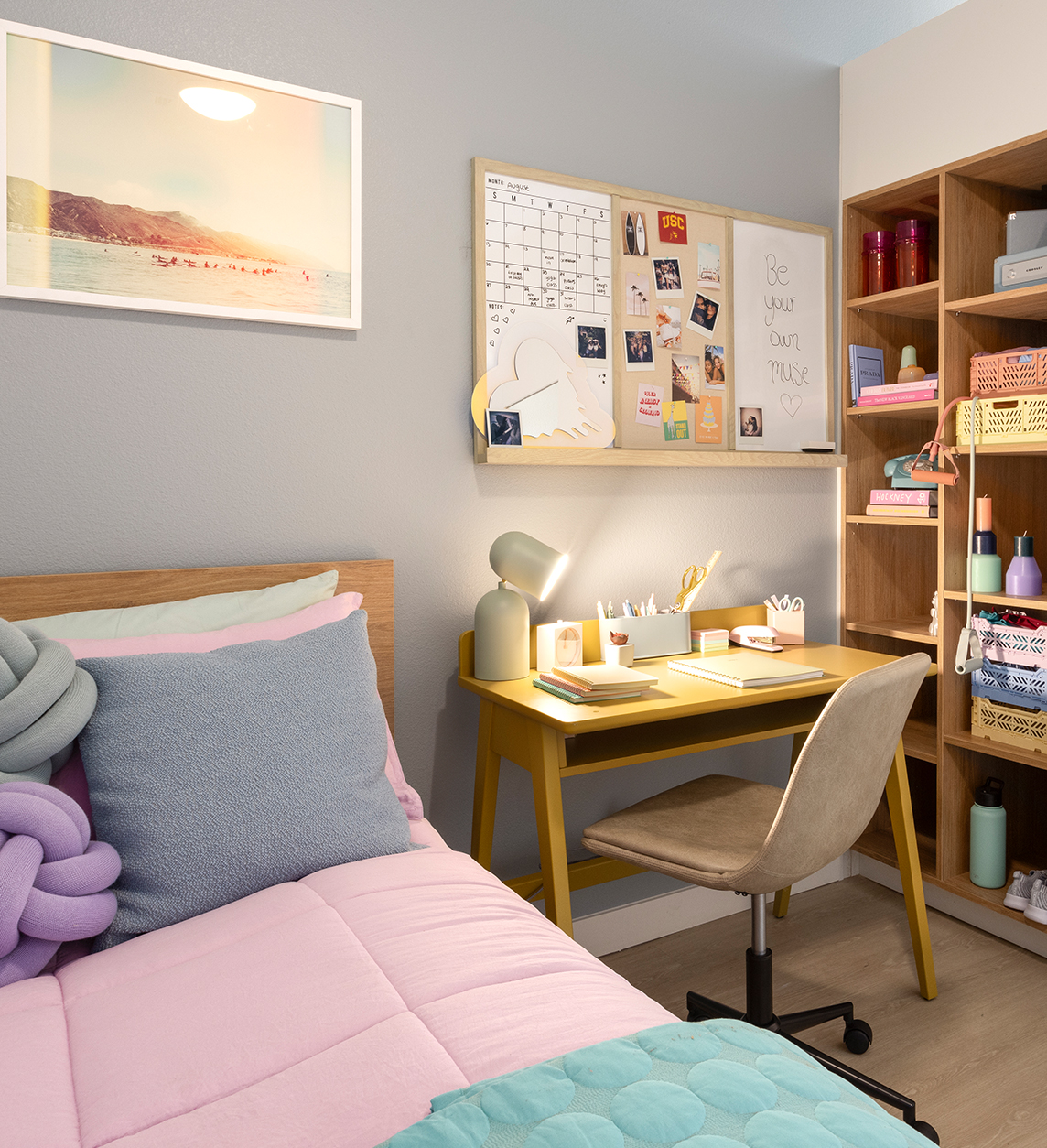 A bedroom with a study desk