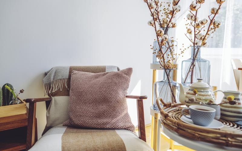 a chair with a pillow on it