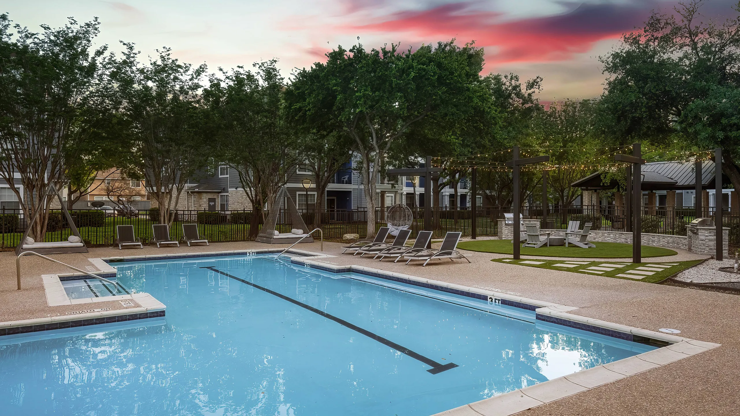 sparkling pool at twilight with farie lights