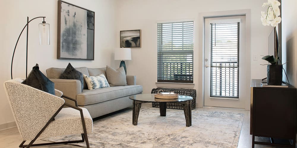 Spacious living room in a model home at The Station at Fleming Island in Fleming Island, Florida