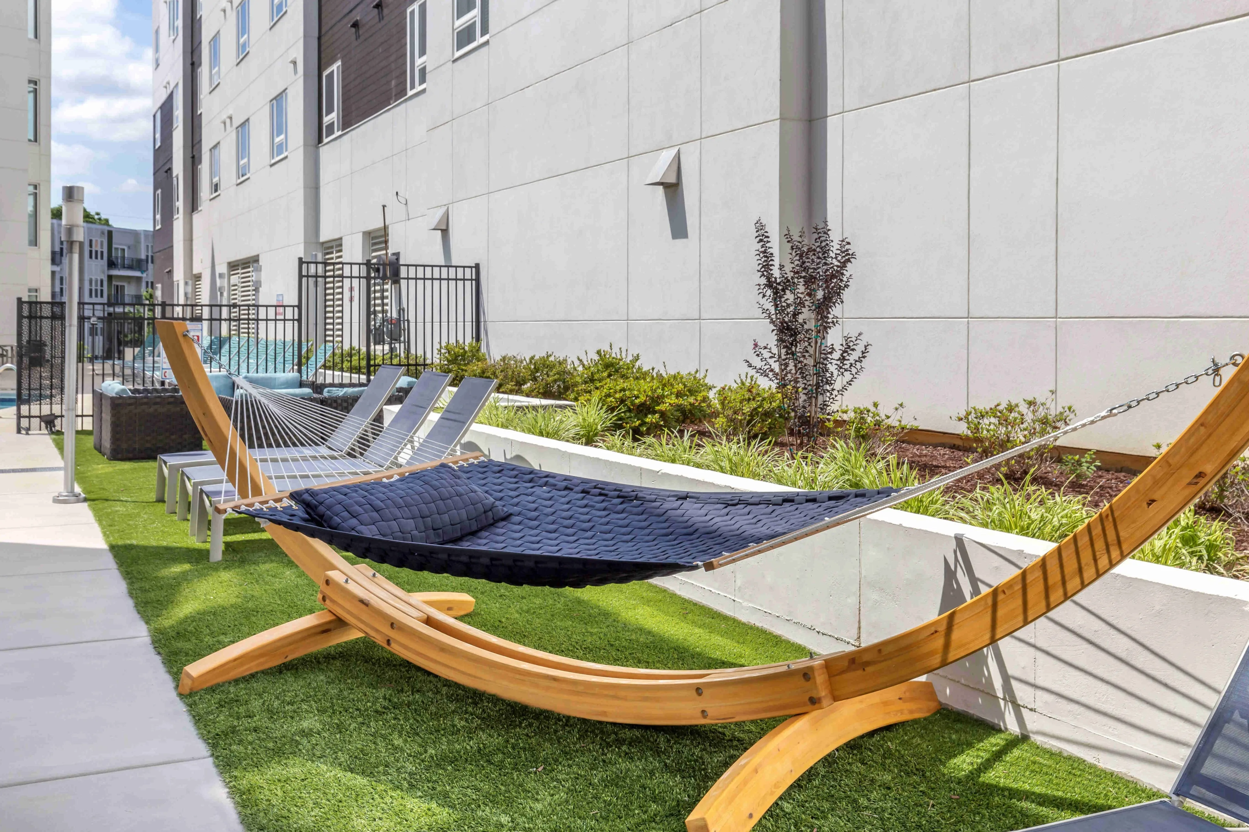 hammock garden with hammock on greenery