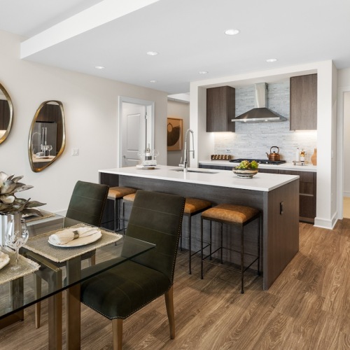 Well-lit kitchen and dining area with ample counter space