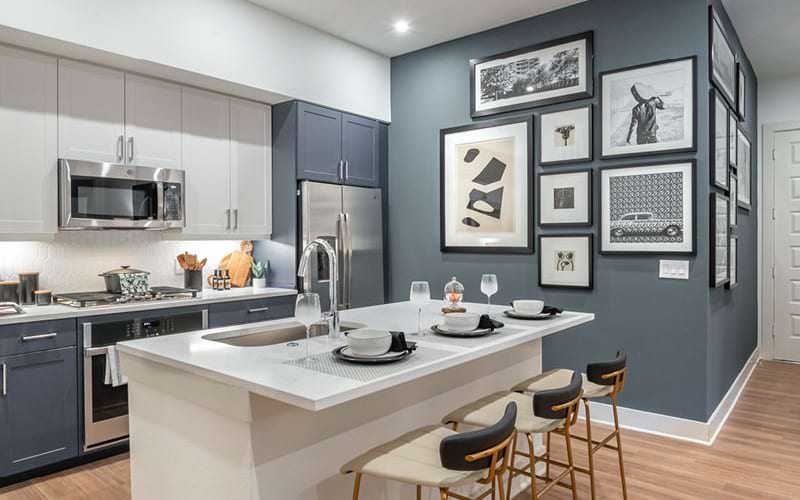 under cabinet lighting in open kitchen with island