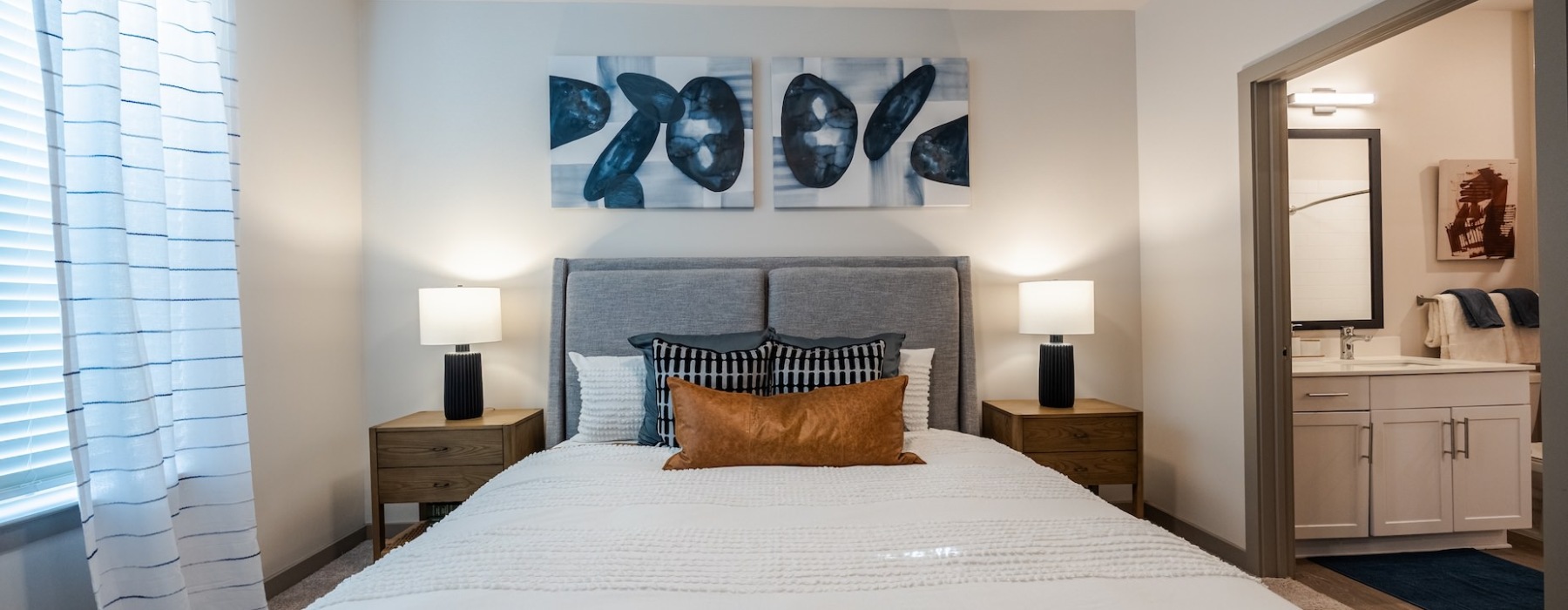 Bright modern bedroom in one-bedroom apartments in Antioch TN at Madison Century Farm.