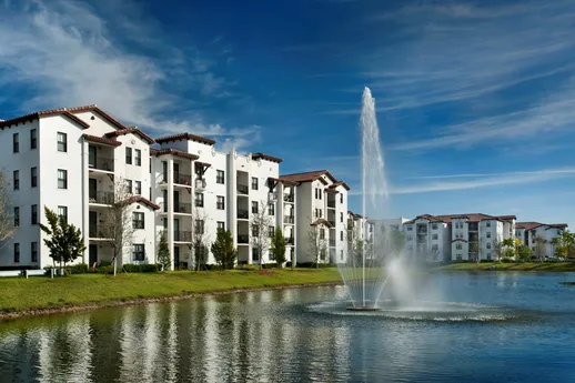 Lake in front of apartment buildings