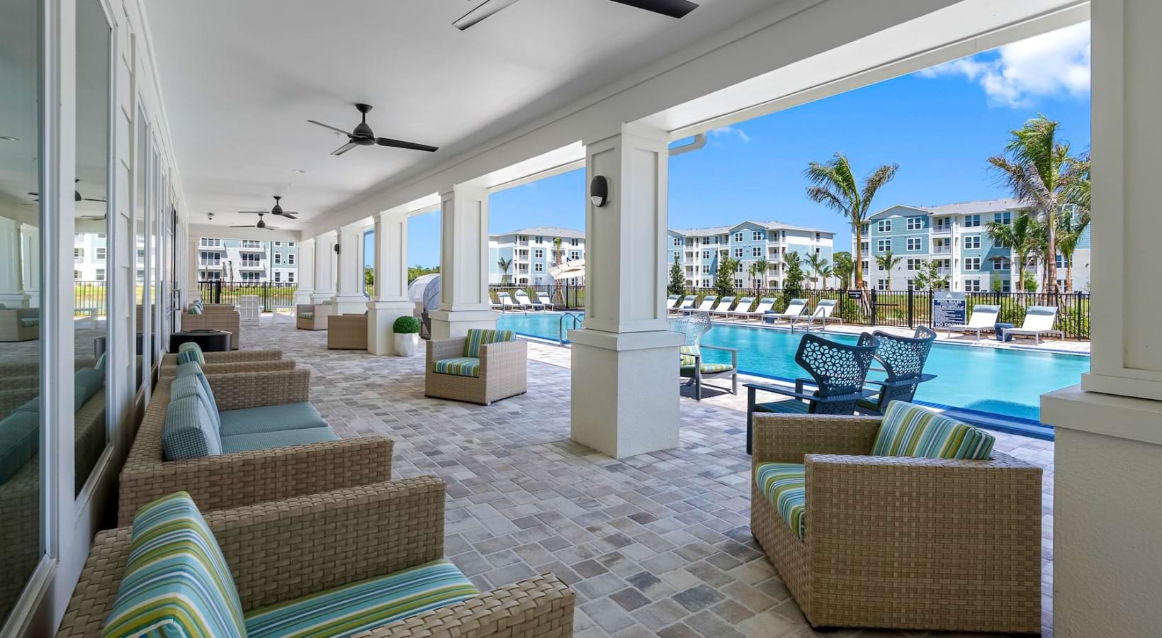 a patio with chairs