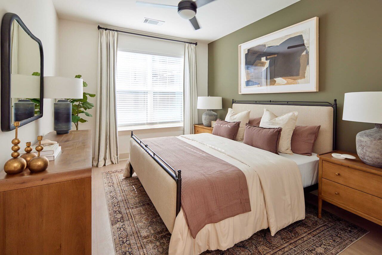 primary bedroom of a Huntersville apartment at Merritt