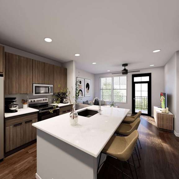 A patio with a table and chairs and a television. at Stack at Wheat Ridge Apartments, Apartments, Wheat Ridge, CO