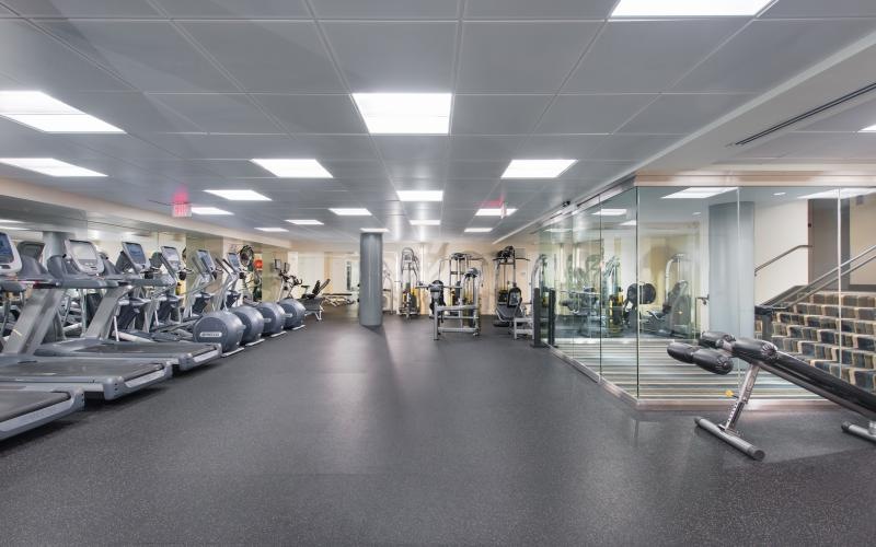 Large fitness center with equipment at Senate Square luxury apartments in Washington, DC.