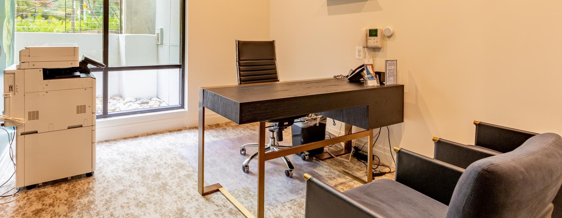 leasing office with large windows