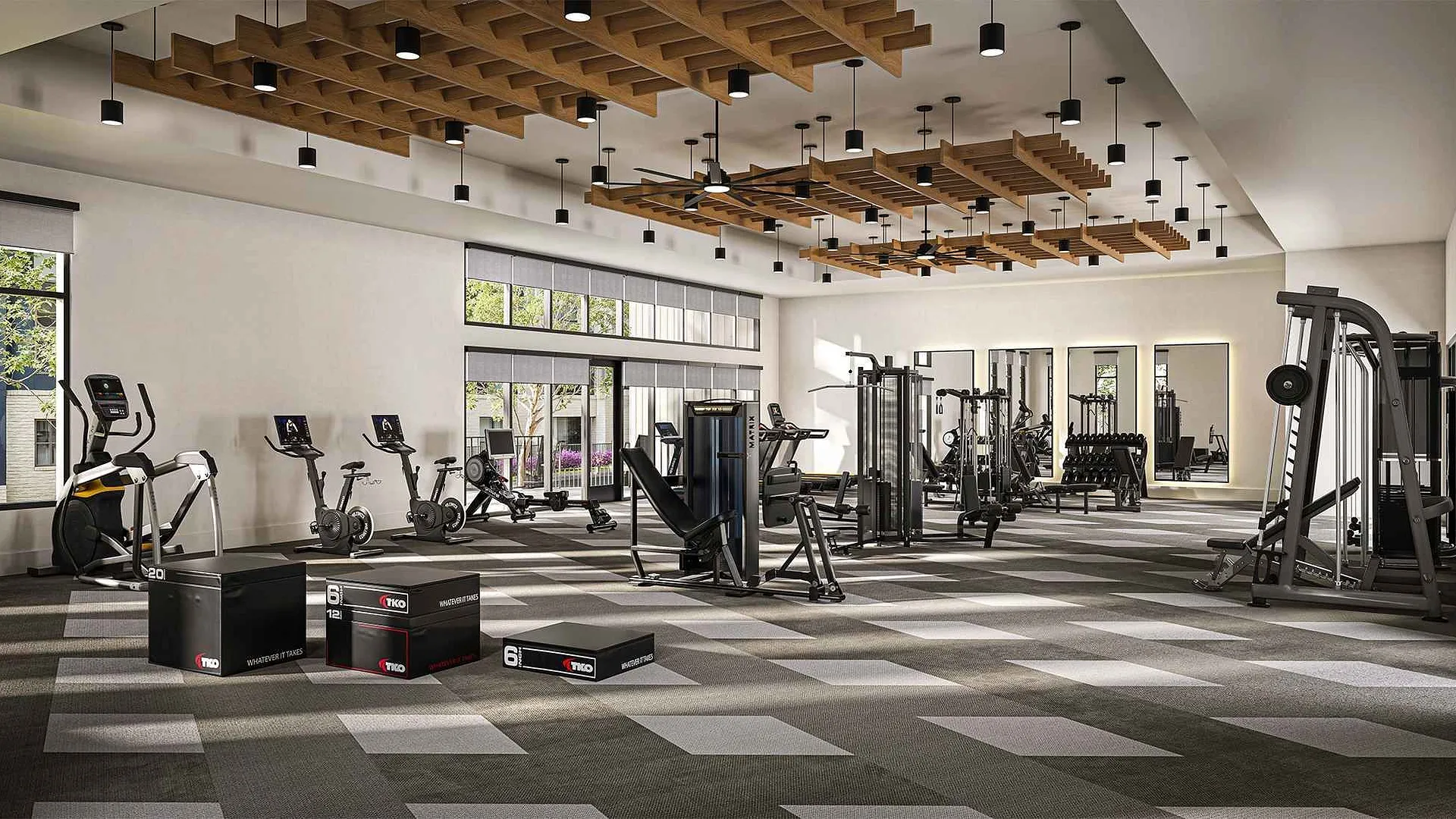 A modern gym with exercise equipment and a spacious design.