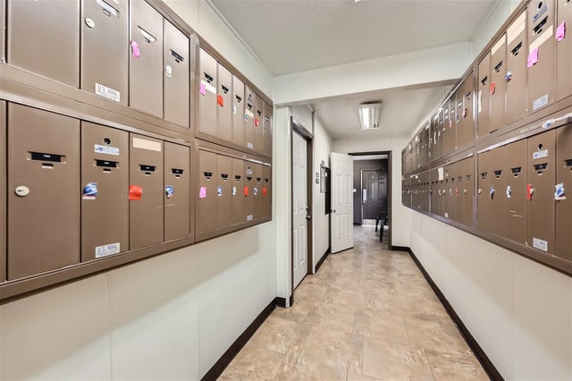 Mailboxes in a building hallway.