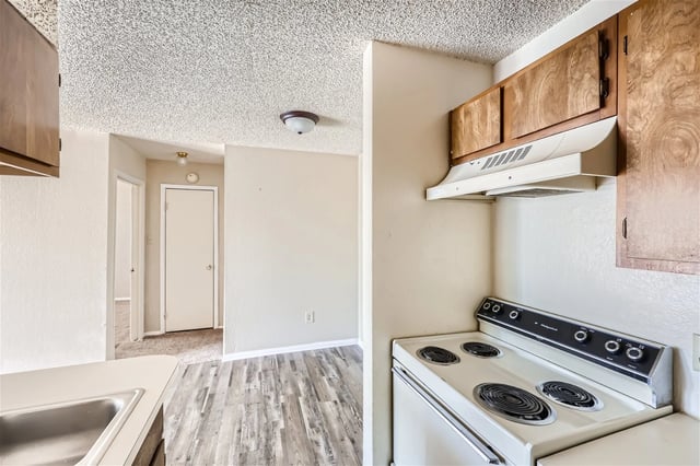 Kitchen with a stove and cabinets