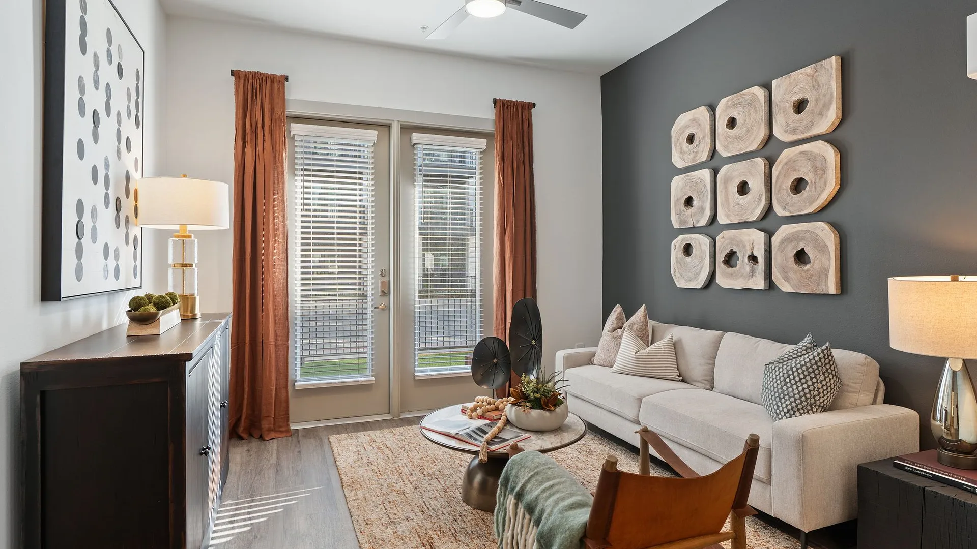 Furnished living room with patio access