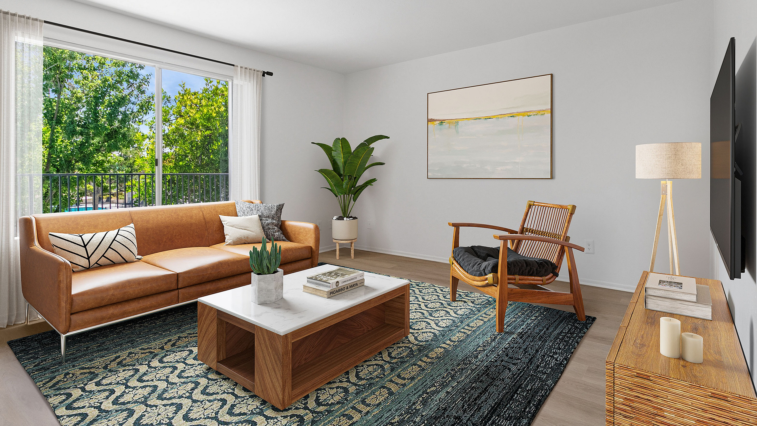 Bright and inviting living room featuring a stylish leather sofa, modern wooden coffee table, and large window with a scenic view.