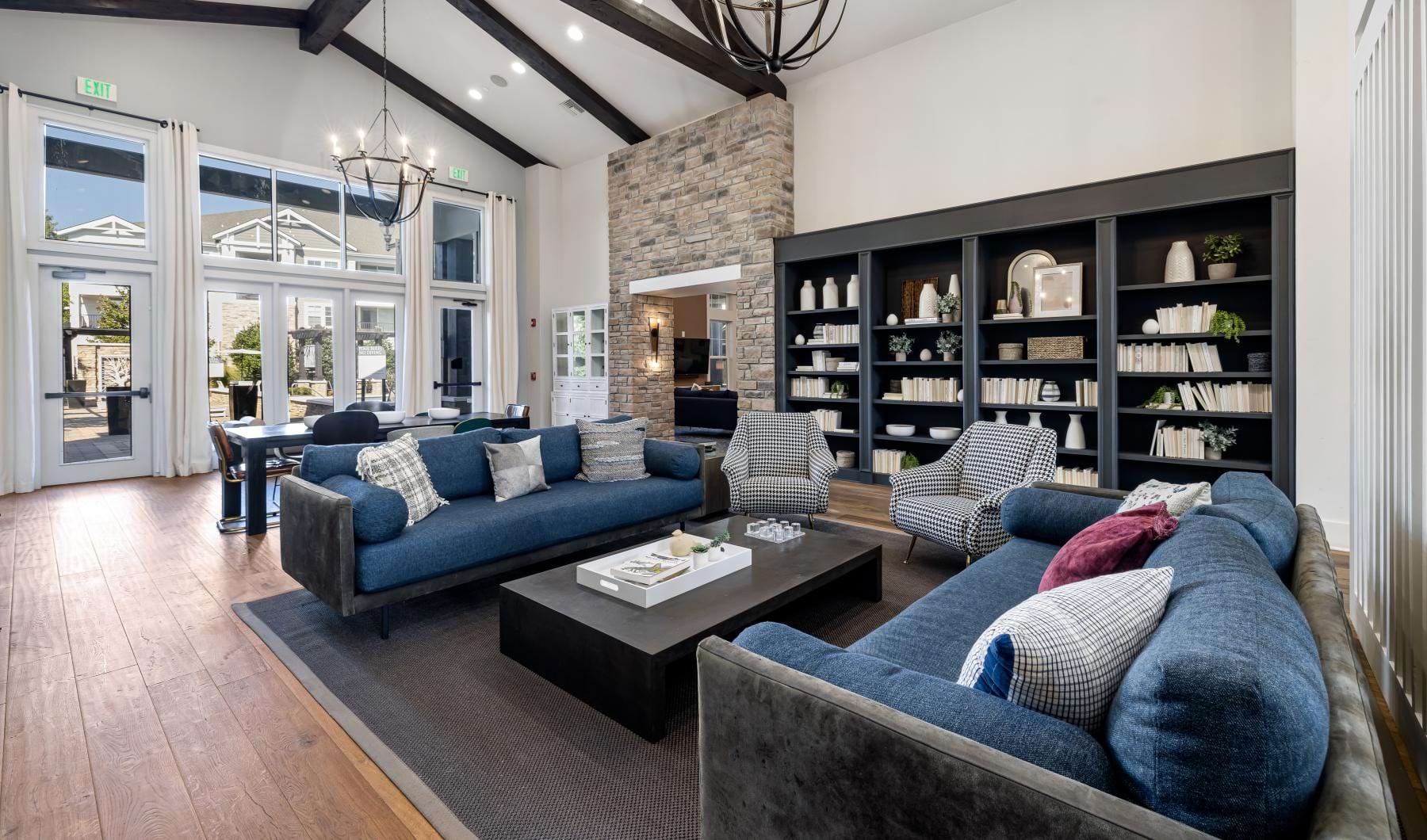 a clubroom with couches and chairs