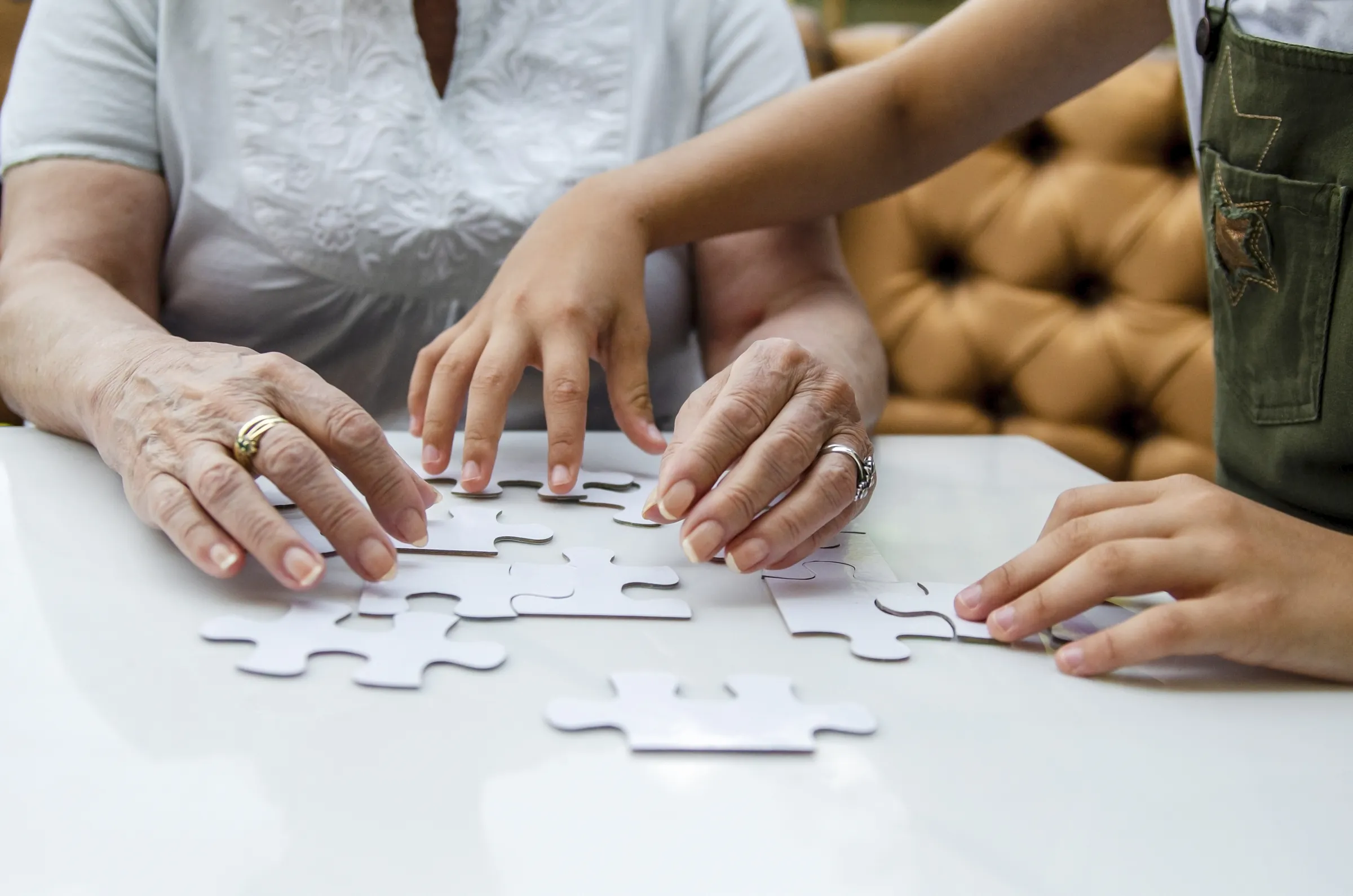 woman doing puzzle with child