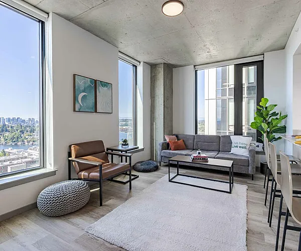 Model apartment showcasing the full size bed, desk, and chairs