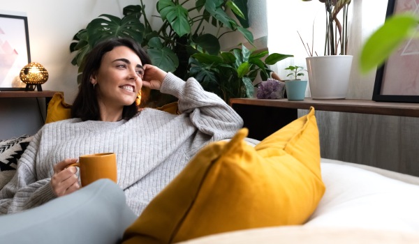 woman enjoying a cup of coffee