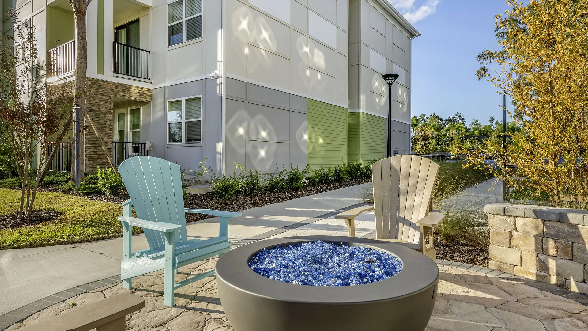 Outdoor lounge area with seating and fire pit