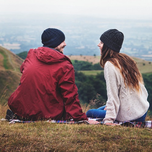 couple on a hill