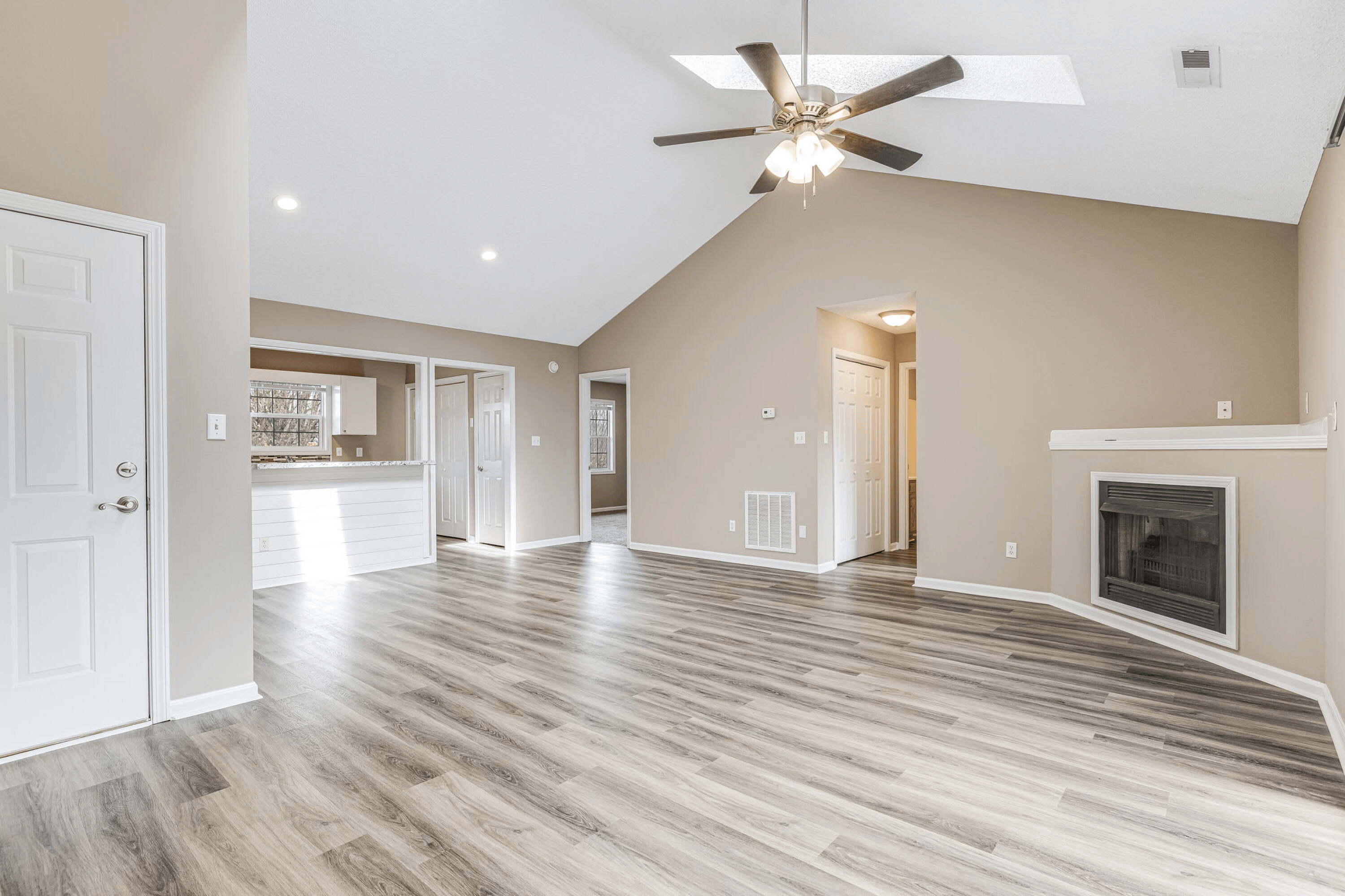 Empty living room with wooden floors
