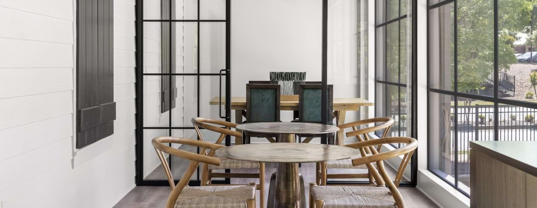 a dining room with a large glass door